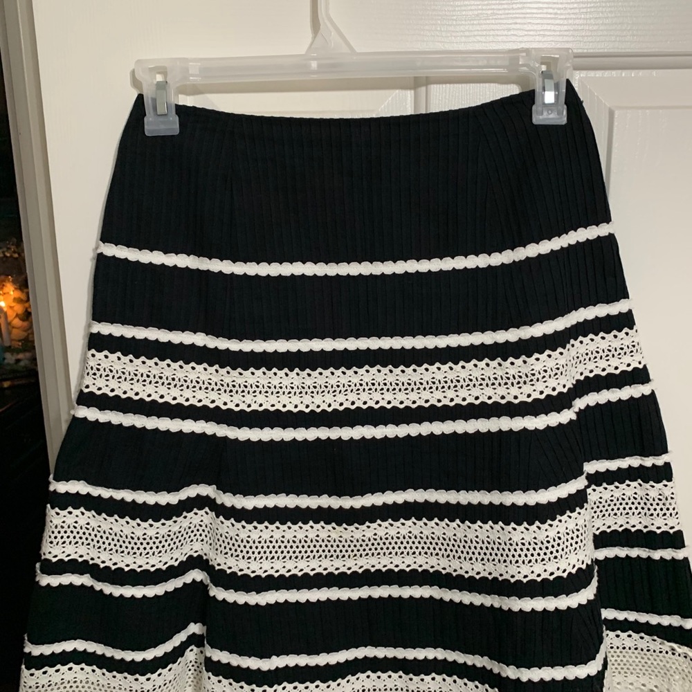 - Adorable black and white skirt